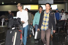 Lao động đi làm việc ở nước ngoài trở về. (Ảnh minh họa: Hữu Việt/TTXVN)