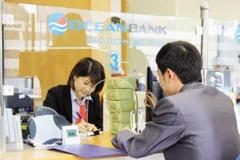 Giao dịch tại OceanBank. (Nguồn: Internet).