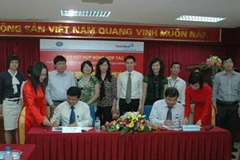 Lãnh đạo hai bên ký kết. (Nguồn: VietinBank).