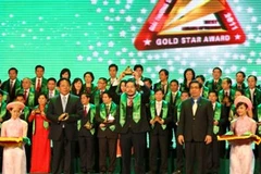 Ông Lương Trí Thìn tại Lễ trao giải Sao Vàng Đất Việt năm 2011. (Nguồn: DXG).