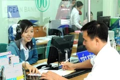 Giao dịch tại OceanBank. (Nguồn: Internet).