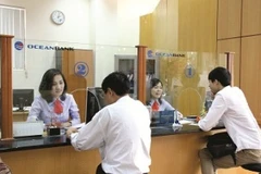 Giao dịch tại OceanBank. (Nguồn: Internet).