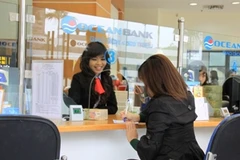 Giao dịch tại OceanBank. (Nguồn: Internet).