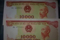 Sẽ không lưu hành tiền cotton loại 10.000 và 20.000 đồng kể từ 1/1/2013.