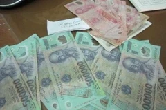 4 triệu đồng tiền giả do Công an Hà Tĩnh phối hợp với Công an tỉnh Nghệ An mới bắt giữ. (Nguồn: Công an Nghệ An).