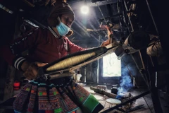 [Photo] Độc đáo nghề dệt vải lanh của người H'Mông ở Vân Hồ 