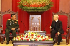 Tổng Bí thư Nguyễn Phú Trọng tiếp Đại tướng Chansamone Chanyalath - Ủy viên Bộ Chính trị, Phó Thủ tướng, Bộ trưởng Bộ Quốc phòng Lào. (Ảnh: Trí Dũng/TTXVN)