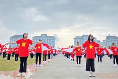 Học sinh đồng diễn "Khát vọng tuổi trẻ Lai Châu" trong Ngày hội thanh, thiếu nhi các dân tộc tỉnh Lai Châu, cuối tháng 10/2022. (Ảnh: Nguyễn Oanh/TTXVN)