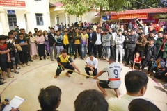 Ngày hội “Xuân Biên phòng ấm lòng dân bản” vùng cao tỉnh Điện Biên. (Ảnh: Xuân Tư/TTXVN)