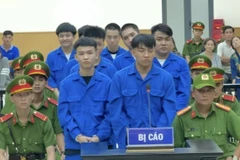 Các bị cáo tại phiên xét xử sở thẩm. (Ảnh: Thanh Sang/TTXVN)