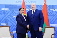 Thủ tướng Phạm Minh Chính gặp Tổng thống Belarus Alexander Lukashenko. (Ảnh: Dương Giang/TTXVN)