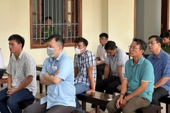 Các bị cáo tại phiên tòa sơ thẩm lần hai ngày 12/8/2024. (Ảnh: TTXVN phát)