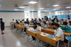 Thí sinh dự Kỳ thi đánh giá năng lực Đại học quốc gia TP Hồ Chí Minh năm 2021. (Ảnh: Thu Hoài/TTXVN)