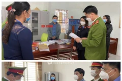 Tống đạt quyết định khởi tố đối với 2 bị can Lê Minh Tâm và Phạm Thị Thanh Thủy. (Nguồn: baonghean.vn)