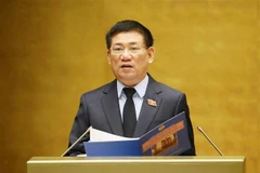 Tổng Kiểm toán Nhà nước Hồ Đức Phớc trình bày Tờ trình về dự án Luật sửa đổi, bổ sung một số điều của Luật Kiểm toán Nhà nước. (Ảnh: Doãn Tấn/TTXVN)
