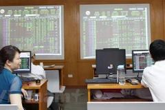 VN-Index vượt ngưỡng 980 điểm. Ảnh minh họa. (Nguồn: Vietnam+)