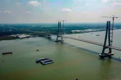 Cầu Vàm Cống bắc qua sông Hậu nối huyện Lấp Vò (Đồng Tháp) với quận Thốt Nốt (thành phố Cần Thơ). (Ảnh: TTXVN phát)