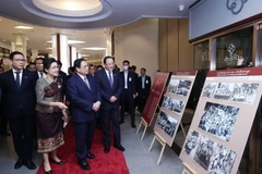 Thủ tướng CHDCND Lào chiêu đãi Thủ tướng và đoàn cấp cao Việt Nam