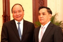 Phó Thủ tướng Nguyễn Xuân Phúc bắt đầu chuyến thăm làm việc tại Lào