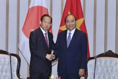 Thủ tướng Nguyễn Xuân Phúc và ông Nikai Toshiro, Tổng thư ký đảng Dân chủ Tự do Nhật Bản đang có chuyến thăm và làm việc Việt Nam. (Ảnh: Thống Nhất/TTXVN)