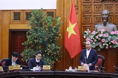 Thủ tướng Nguyễn Xuân Phúc chủ trì cuộc họp. (Ảnh: Thống Nhất/TTXVN)