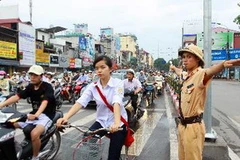 Phân luồng giao thông tại Hà Nội. (Ảnh: Doãn Tấn/TTXVN)