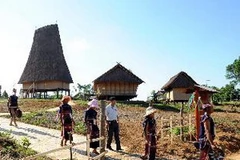 Quang cảnh một góc khu làng của người dân tộc Tây Nguyên tại Làng văn hóa, du lịch các dân tộc Việt Nam. (Ảnh Thanh Hà/TTXVN)