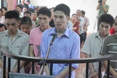 Các bị cáo tại phiên tòa. (Ảnh: Hoàng Tiến/Vietnam+)