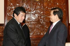 Chủ tịch nước Nguyễn Minh Triết tiếp ông Satoshi Ishikawa, Chủ tịch hãng thông tấn Kyodo (Nhật Bản) đang ở thăm và làm việc tại Việt Nam. (Ảnh: Nguyễn Khang/TTXVN)