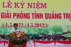 Trưởng Ban Tuyên giáo Trung ương Đinh Thế Huynh phát biểu tại lễ Kỷ niệm. (Ảnh: Dương Vương Lợi/Vietnam+)