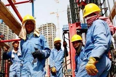 Lao động Việt Nam tại Malaysia. (Ảnh: Tuổi trẻ) 