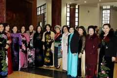 Nữ đại biểu Quốc hội dự kỳ họp thứ chín. (Ảnh: Nguyễn Dân/TTXVN)