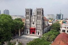 Nhà nước Việt Nam là tôn trọng quyền tự do tín ngưỡng tôn giáo của mọi công dân. (Ảnh Nhà thờ Lớn Hà Nội của Nhật Anh/TTXVN)