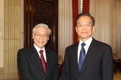 Tổng Bí thư Nguyễn Phú Trọng hội kiến với Thủ tướng Quốc vụ viện nước CHND Trung Hoa Ôn Gia Bảo. (Ảnh: Trí Dũng/TTXVN)