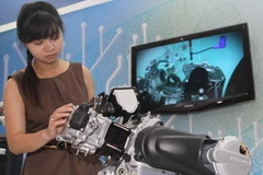 Triển lãm những giải pháp về môi trường kinh doanh xanh của châu Âu cho Việt Nam - GreenBiz 2011. (Ảnh: Thanh Vũ/TTXVN)