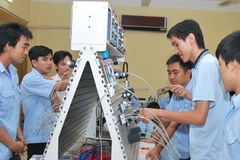 Học viên trường Cao đẳng Nghề Thành phố Hồ Chí Minh. (Ảnh: Phương Vy/TTXVN)