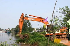 Lễ động thổ khởi công công trình. (Ảnh: Hồ Cầu/TTXVN)