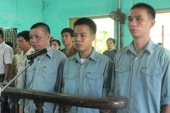 Các đối tượng tại phiên xét xử. (Ảnh: Hoàng Ngọc/Vietnam+)