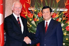Chủ tịch nước Trương Tấn Sang đón Ngài David Johnston, Toàn quyền Canada. (Ảnh: Nguyễn Khang/TTXVN)