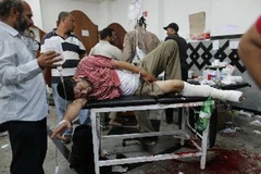 Điều trị cho người bị thương sau vụ xung đột, tại Cairo ngày 8/7. (Nguồn: THX/TTXVN)