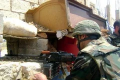 Binh sỹ Syria trong chiến dịch tại Qusayr ngày 20/5. (Nguồn: AFP/TTXVN)