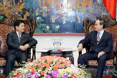 Phó Thủ tướng Nguyễn Thiện Nhân tiếp Tỉnh trưởng tỉnh Vân Nam (Trung Quốc) Lý Kỷ Hằng. (Ảnh: Dương Giang/TTXVN)