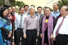 Tổng Bí thư Nguyễn Phú Trọng với các đại biểu. (Ảnh: Trí Dũng/TTXVN)