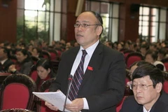 Quốc hội thảo luận ở hội trường về một số nội dung còn ý kiến khác nhau của Dự thảo Luật Kiểm toán độc lập. (Ảnh: Thống Nhất/Vietnam+)