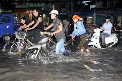 Triều cường ở TP.HCM. (Ảnh: Phương Vy/TTXVN)