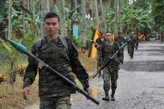 Các tay súng MILF tại căn cứ Darapan ở tỉnh Sultan Kudarat thuộc đảo Mindanao, miền nam Philippines ngày 5/9/2011. (Nguồn: AFP/TTXVN)