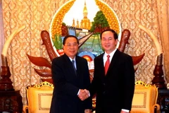 Chủ tịch nước Lào Chummaly Sayasone tiếp Bộ trưởng Trần Đại Quang. (Ảnh: Hoàng Chương/Vietnam+)