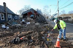Cảnh tàn phá do bão Sandy tại New Dorp, New York ngày 4/1. (Nguồn: AFP/TTXVN)