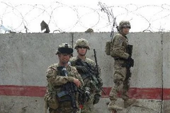 Binh sỹ Mỹ gác tại trụ sở cảnh sát ở tỉnh Wardak ngày 17/3. (Nguồn: THX/TTXVN)