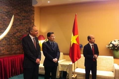 Quang cảnh lễ trao huân chương. (Ảnh: Lê Hà-Trung Dũng/Vietnam+)